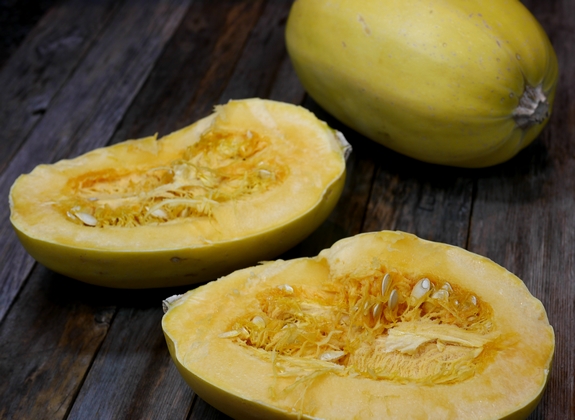 Sinfully Decadent Spaghetti Squash Bake in half