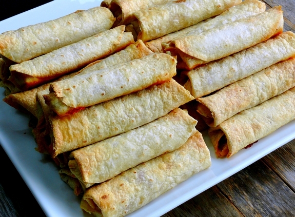 Oven Baked Pulled Pork Flautas stacks