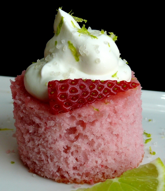 VIDEO + RECIPE: A Daiquiri mixer and tequila give these Strawberry Margarita Cakes Bites their namesake. The lime zested whipped cream flecked with sea salt is reminiscent of a salted rim on a margarita glass from NoblePig.com #noblepig #Boozydessert #margarita #strawberrydessert #strawberry