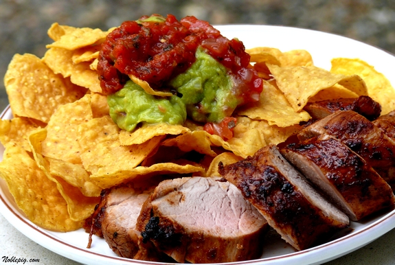 Chili-lime pork tenderloin with corn chips, guacamole and salsa.