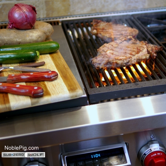 2 Noble Pig Sub Zero Wolf Grilling on range