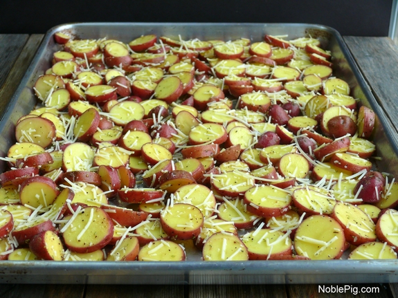 Cheesy Crushed Rosemary Potato Coins red potatoes ready for the oven