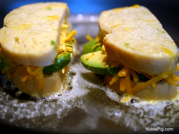 Noble Pig Stuffed Avocado and Cheese French Toast sizzling