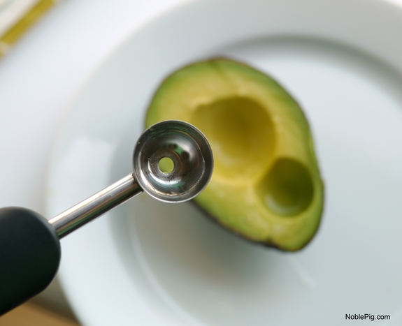 Avocado Caprese Bites making the avocado balls 