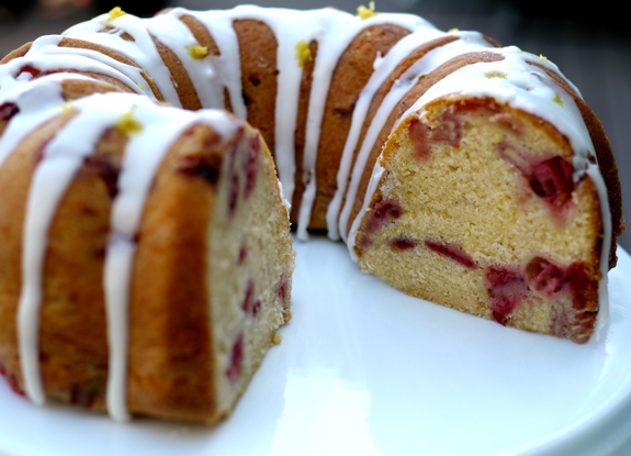 VIDEO + RECIPE: This from scratch Strawberry Lemon Cream Cheese Pound Cake is a deliciously rich cake that is not overly sweet. I've incorporated cream cheese, which is unusual for pound cake. The cream cheese gives the cake a springy crumb texture, richness and tenderness, while keeping the cake moist for several days. It is the perfect choice for strawberry season and beyond from NoblePig.com. #noblepig #poundcake #strawberrycake #cake #lemoncake