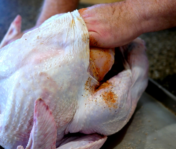 Juicy Smoked Paprika Turkey preparing the turkey