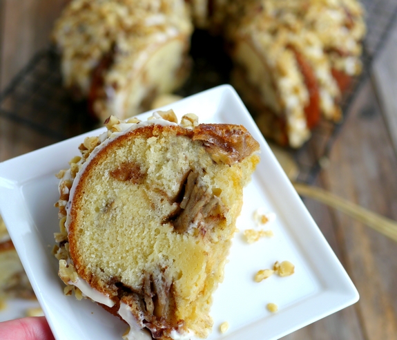 Apple Chai Cake with Maple Cream Cheese Drizzle have a slice
