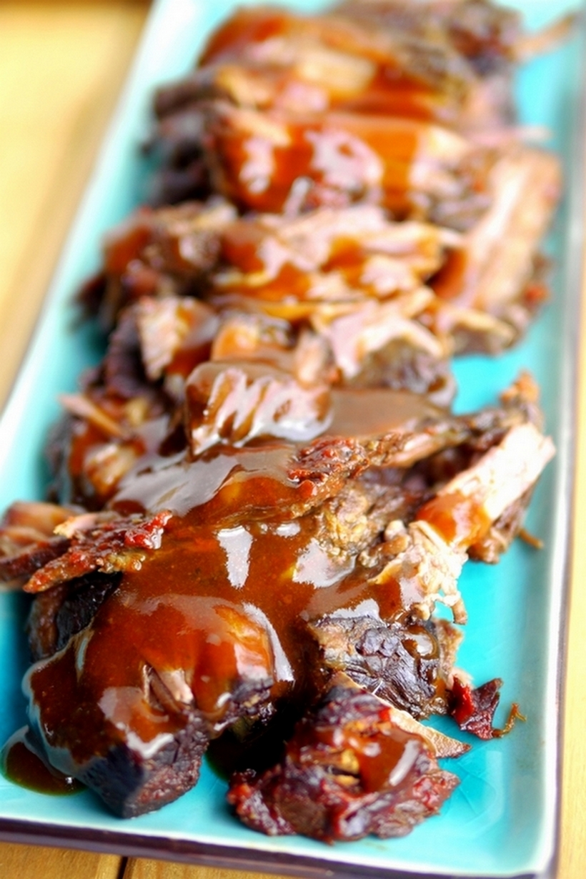 VIDEO + RECIPE: The Best Tasting Slow Cooker Tangy Brisket Recipe will become a family favorite for years to come. The fork-tender, melt in your mouth meat and mouthwatering sauce are a true example of what brisket is supposed to taste like. #noblepig #slowcooker #slowcookerbrisket #beef #easydinners