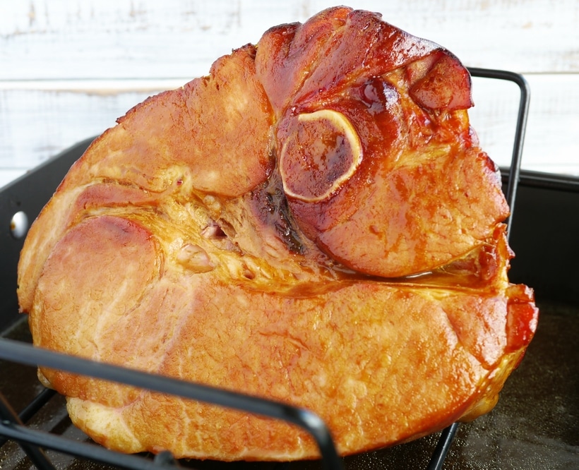 This Baked Ham with Rum and Coke Glaze steals the holiday spotlight with its sweet and savory glaze, a distinctive twist that's always a crowd-pleaser. The bold combination of rum and Coke, elevates the juicy, tender ham and makes every bite unforgettable. glazed ham with coke