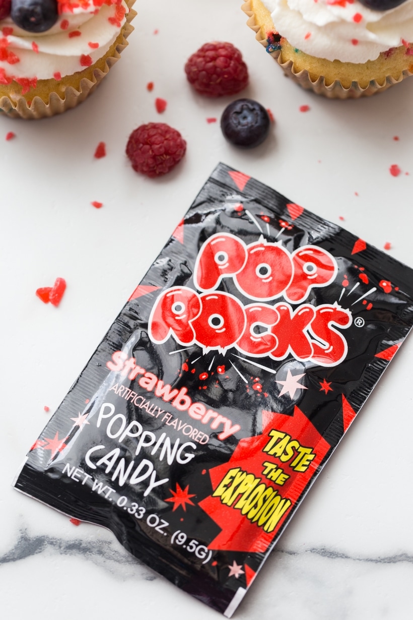 Pop Rocks and 4th of July cupcakes topped with whipped cream and fresh fruit.