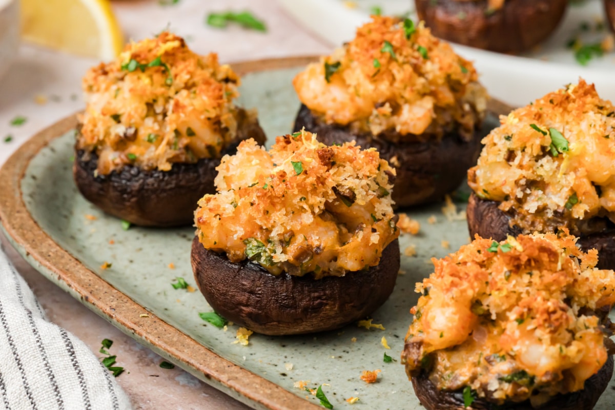 Stuffed mushrooms with shrimp and cream cheese topped with golden Parmesan panko
