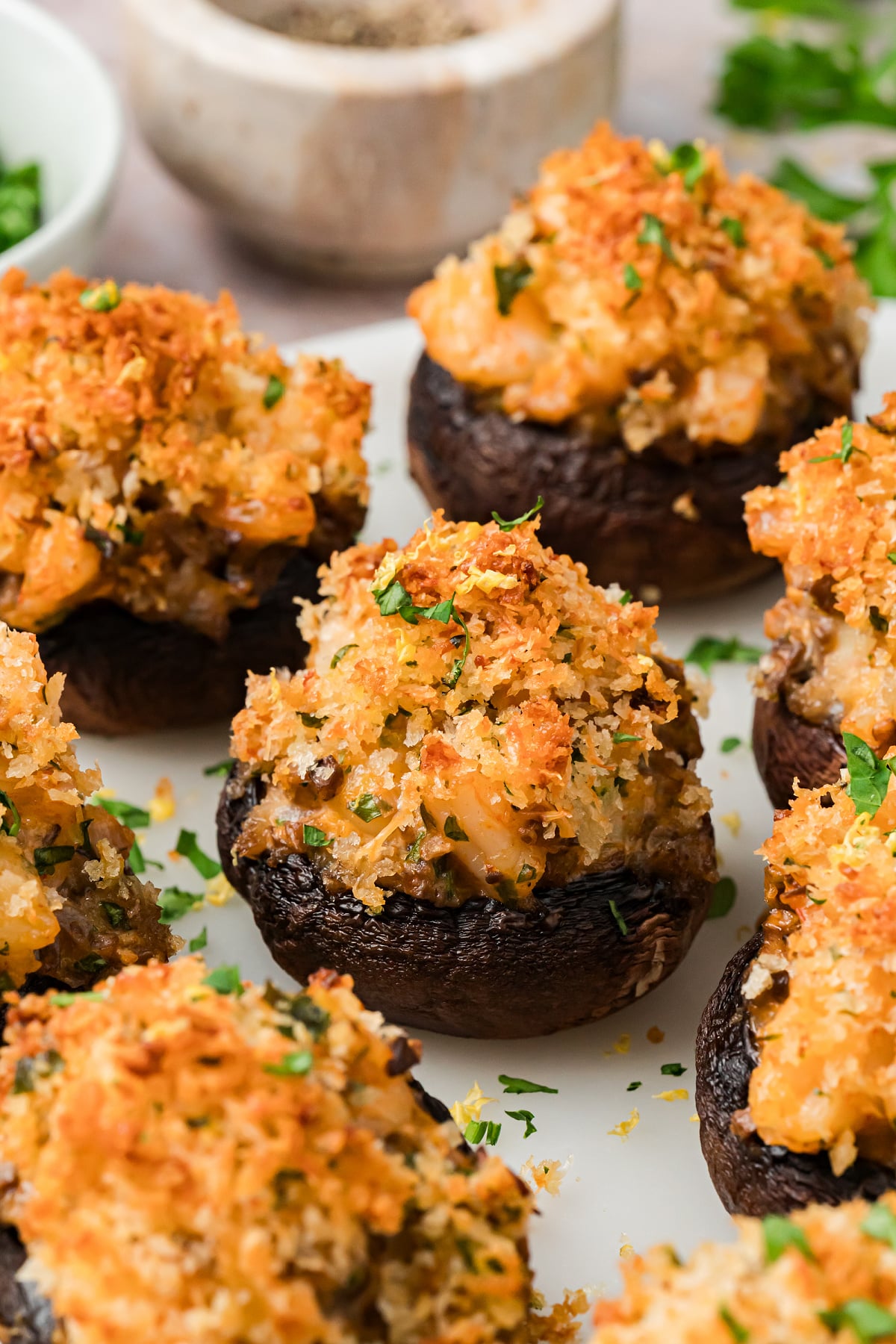 Shrimp stuffed mushrooms with cream cheese filling and golden Parmesan panko topping