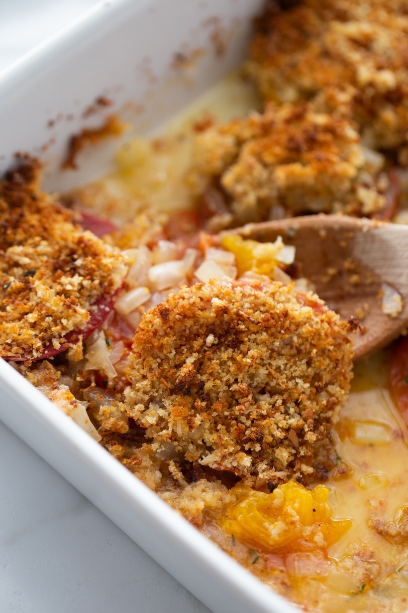 Discover the perfect way to enjoy ripe summer tomatoes with this flavorful tomato gratin. A delicious side dish that pairs well with any meal. tomato casserole