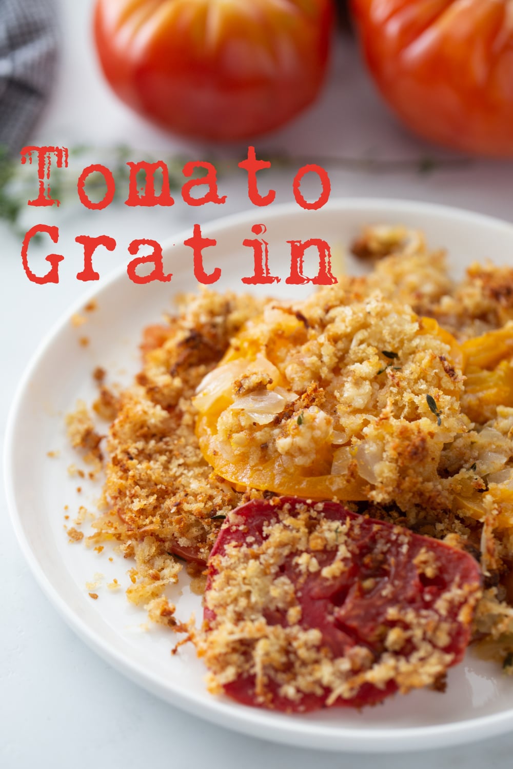 Discover the perfect way to enjoy ripe summer tomatoes with this flavorful tomato gratin. A delicious side dish that pairs well with any meal. via @cmpollak1