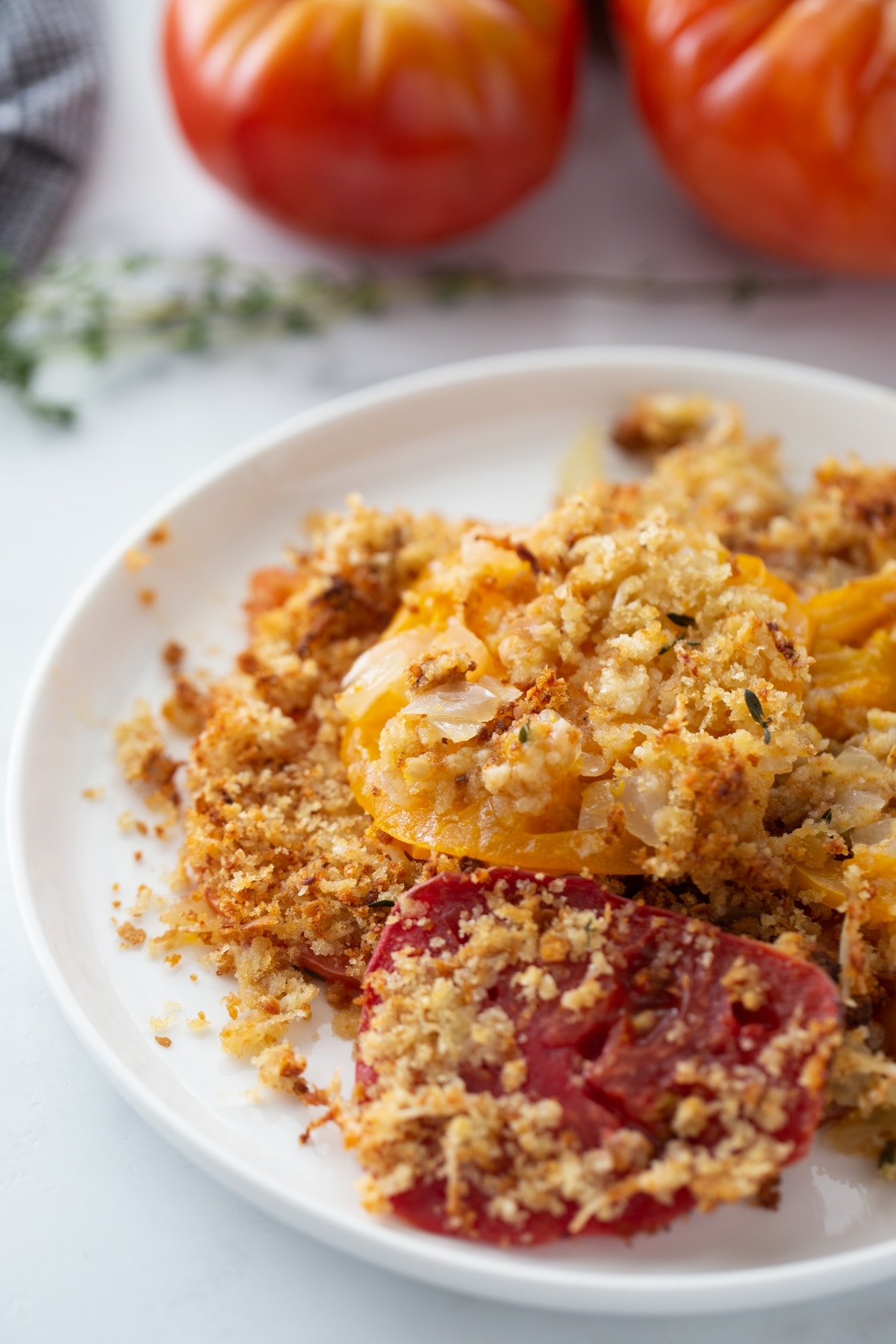 Discover the perfect way to enjoy ripe summer tomatoes with this flavorful tomato gratin. A delicious side dish that pairs well with any meal. what to make with tomatoes