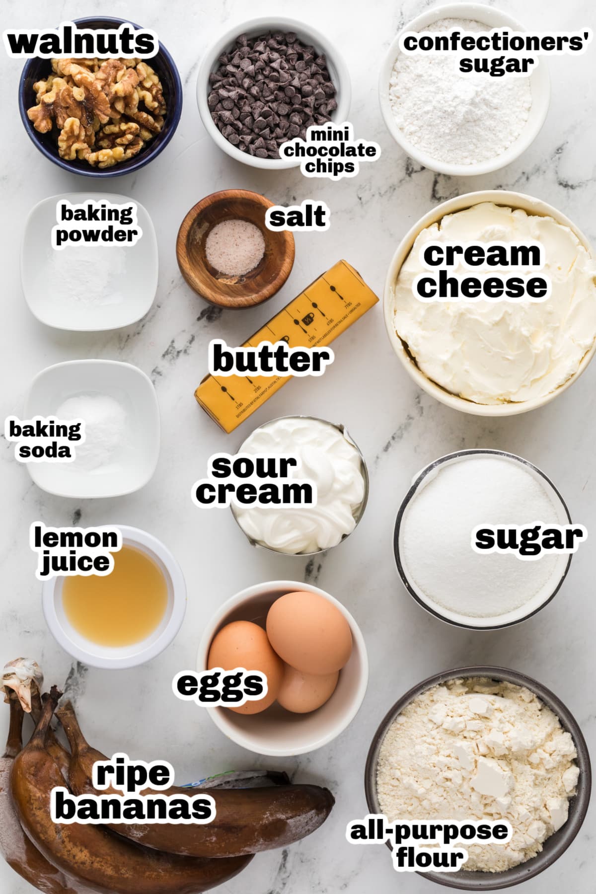 Banana Sheet Cake with Cream Cheese Sour Cream Frosting ingredients Ingredients for banana sheet cake with cream cheese sour cream frosting arranged on a counter.