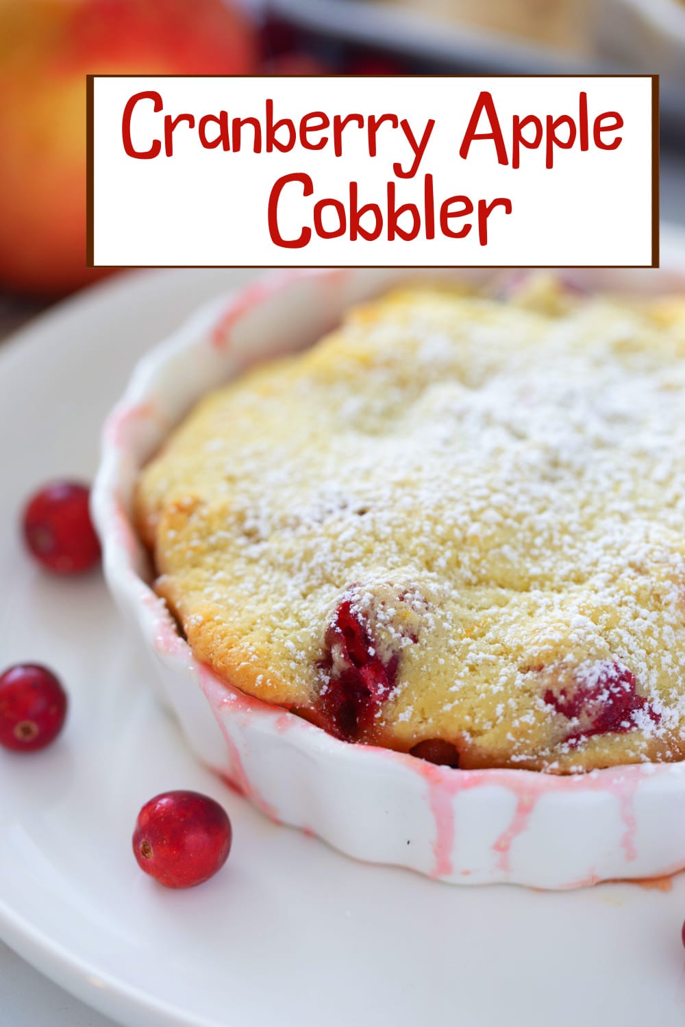 This cranberry apple cobbler combines sweet apples and tart cranberries beneath a buttery, golden topping—perfect for Thanksgiving and holiday gatherings. Versatile in preparation, it can be baked in individual dishes or a single large pan to suit your serving needs. via @cmpollak1