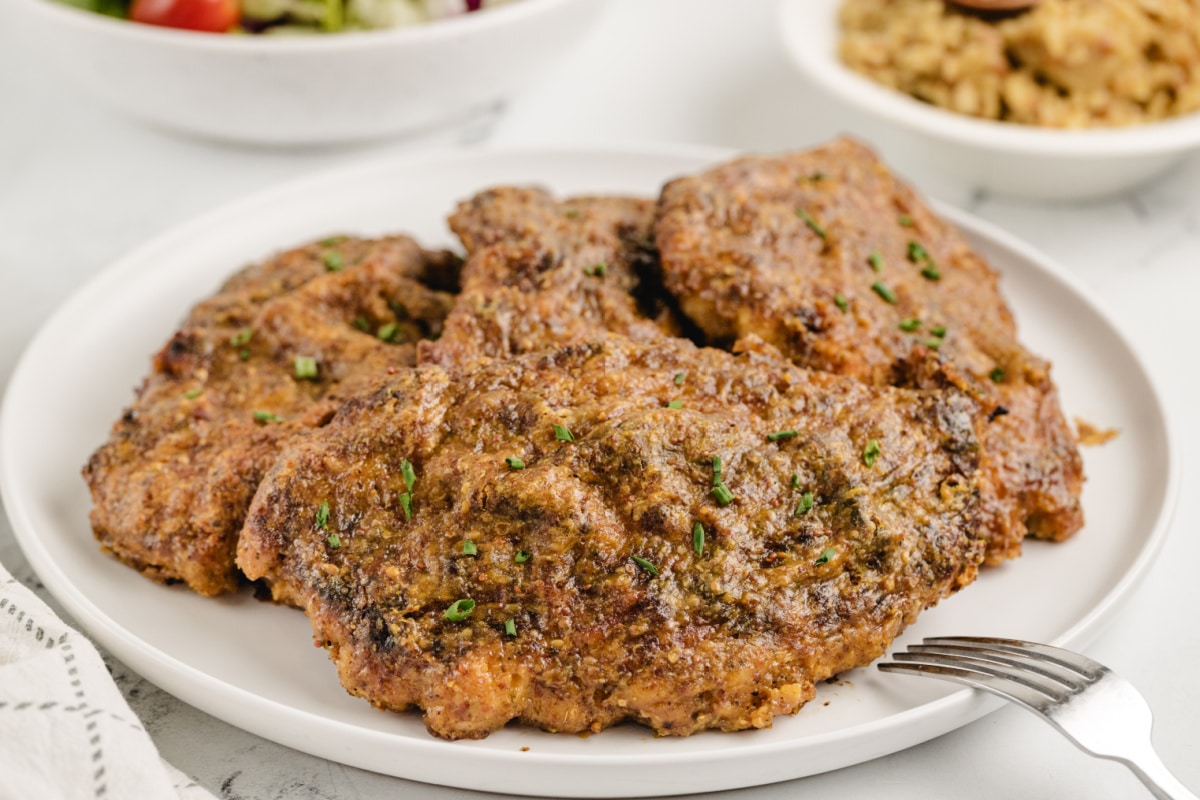 Plated chicken cutlet with golden crust, ready for a weeknight dinner