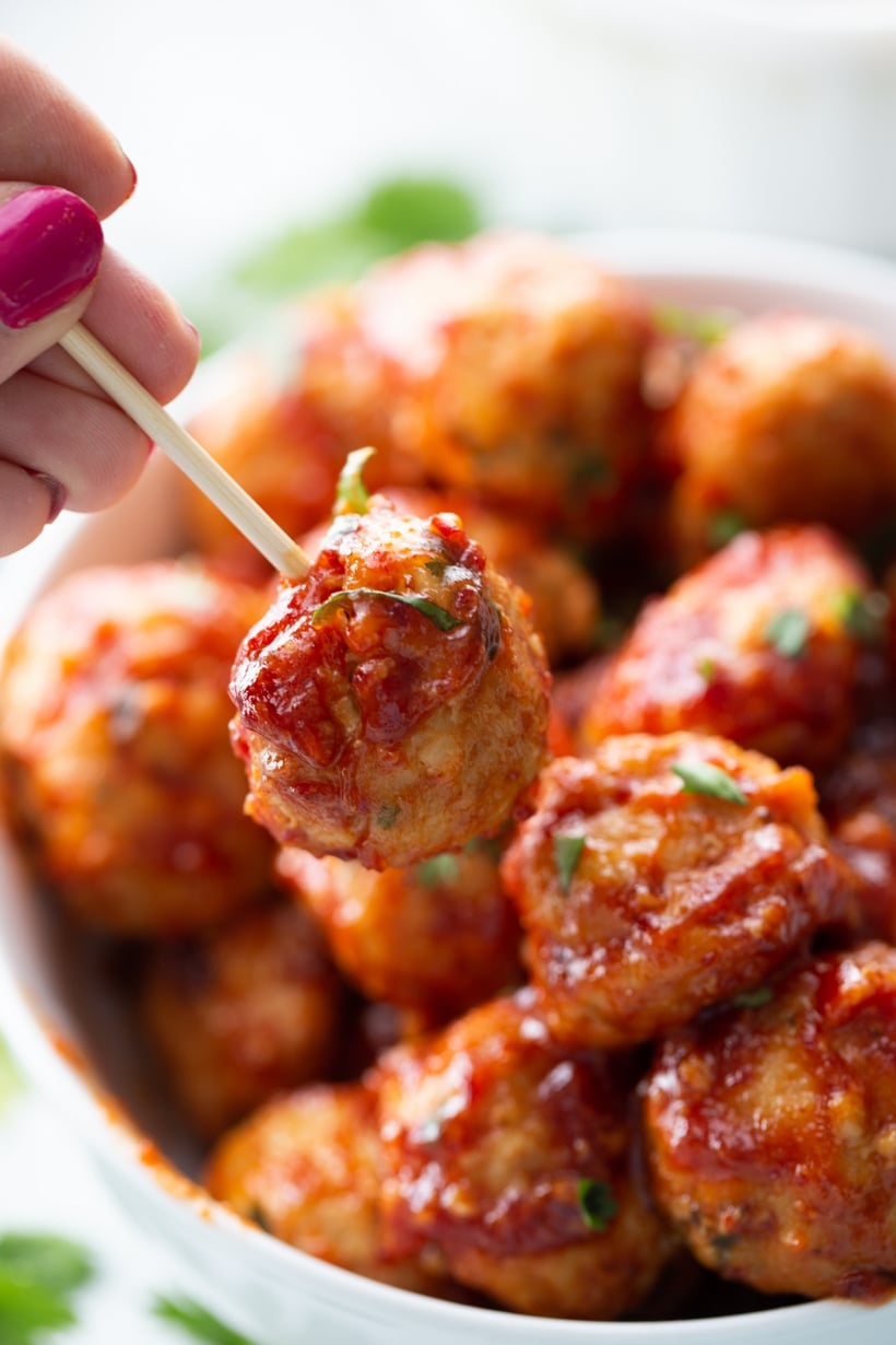 Chicken Meatballs with Chipotle-Honey Sauce - a saucy and sassy chicken meatball recipe you'll serve again and again. Every bite is packed with flavor making them the perfect choice for game day, holidays or a Friday night. ground chicken meatball recipe