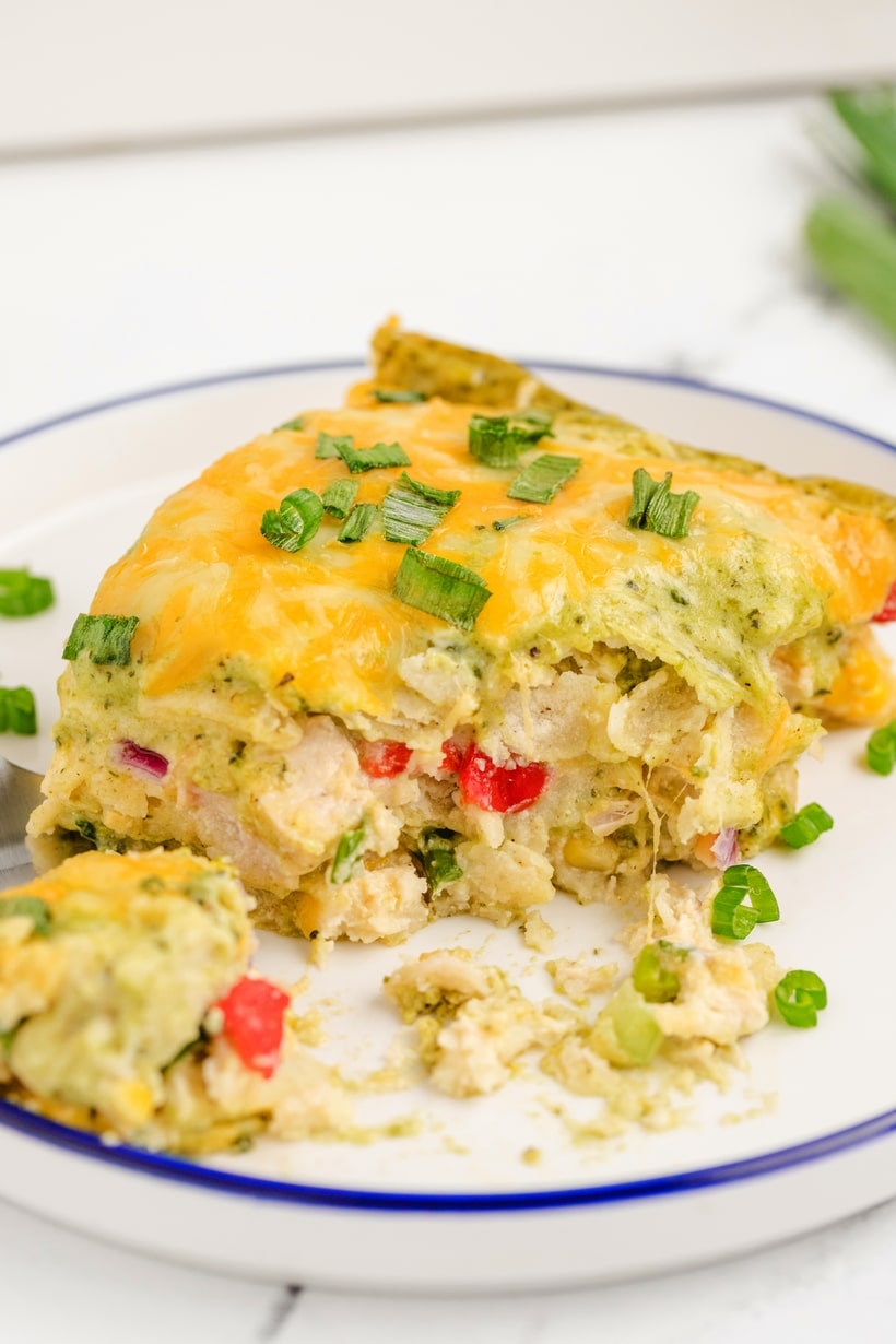 This Chicken Poblano Casserole brings together a creamy, roasted poblano sauce, juicy chicken, gooey cheeses and layers of tortillas that deliver an enchilada-inspired dinner creation you're going to love. This cheesy casserole effortlessly transitions from a comforting weeknight dinner to a show-stopping, flavor-packed dish for festive celebrations. roasting poblano peppers