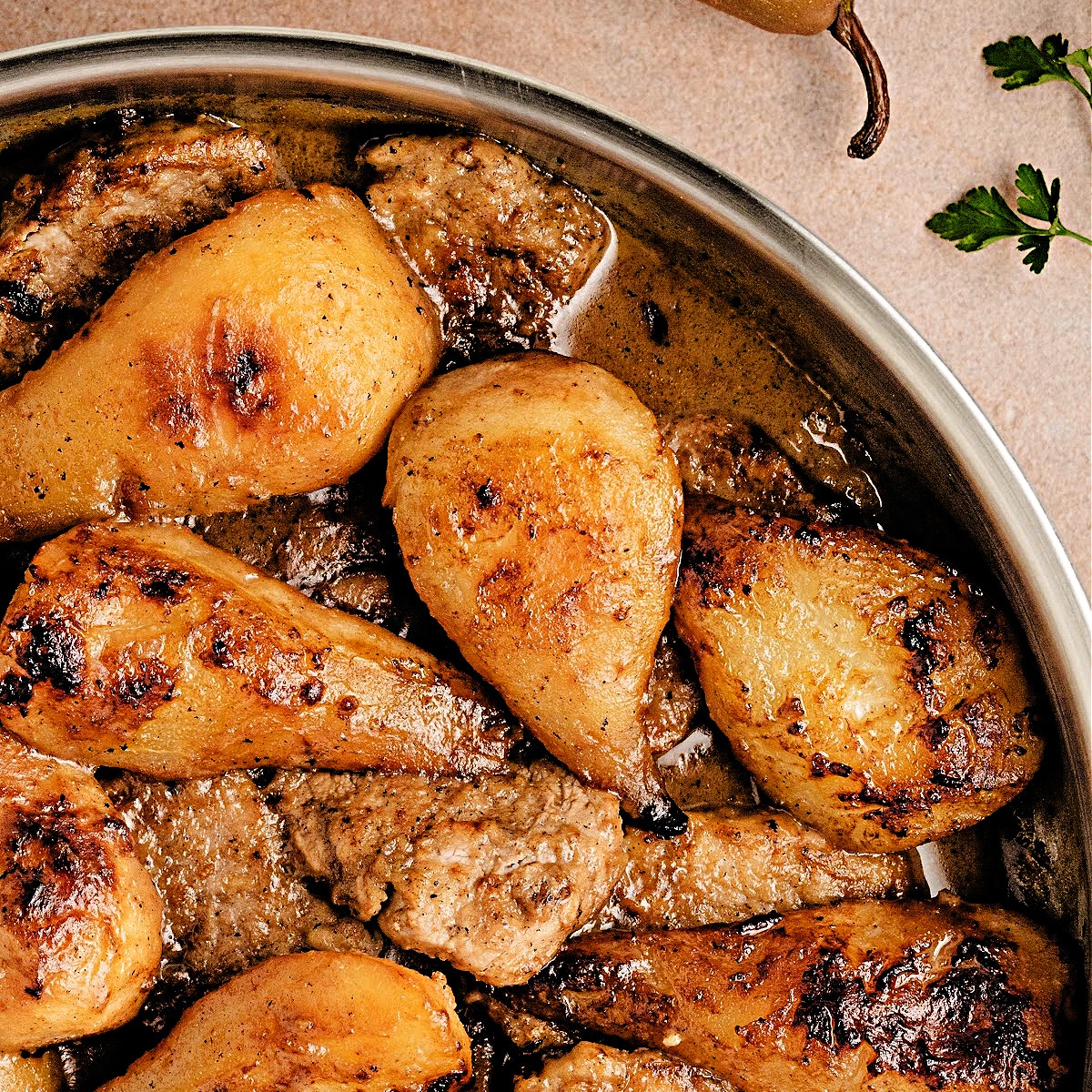 Vanilla Cider Pork with caramelized Pears cooked in a skillet with caramelized Bosc pears and a buttery cider-vanilla sauce.