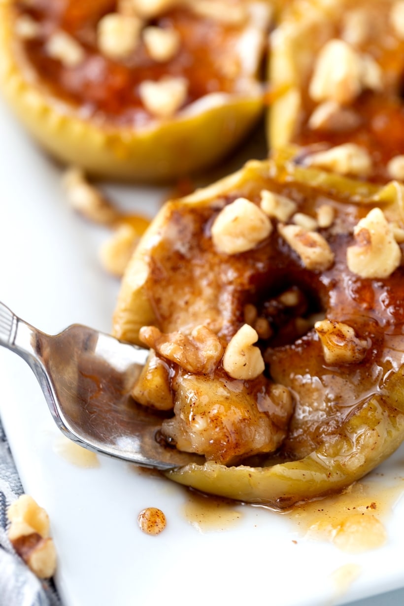 Baked Apples with Maple-Walnut Sauce is essentially apple pie without all the fuss. This baked apples recipe will have you looking forward to apple season every year. Baked apples maple walnut sauce