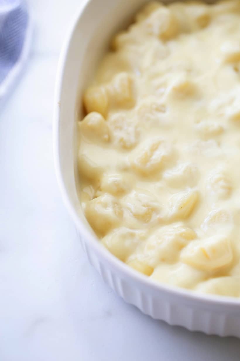 cheese sauce poured over top in a serving dish.