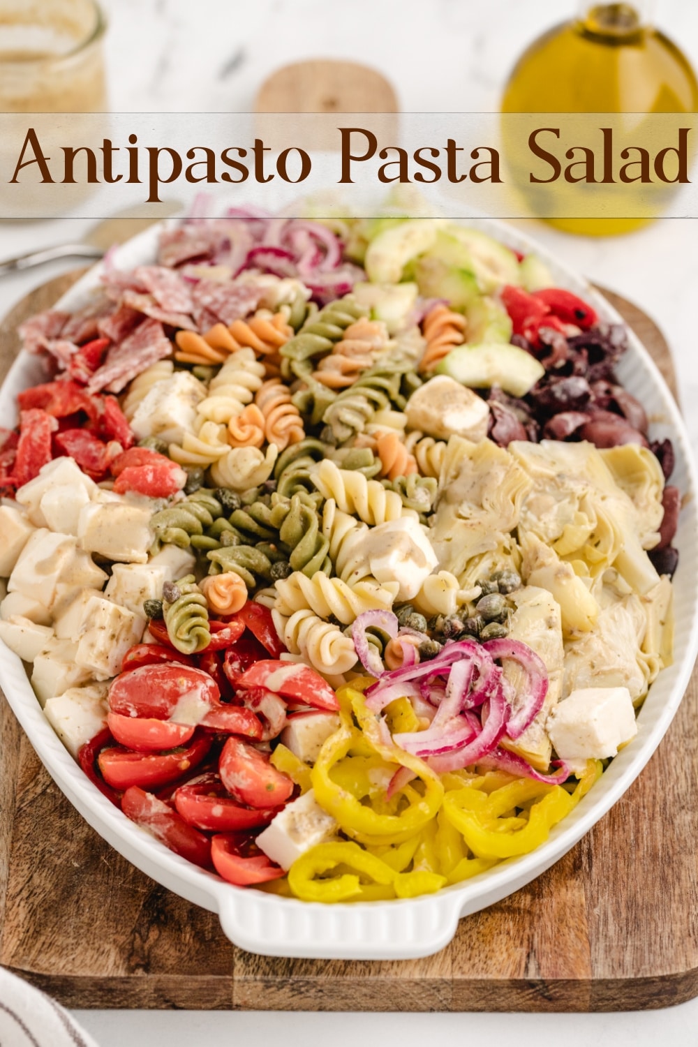 Every bite of this antipasto pasta salad, with its tangy red wine vinaigrette, crunchy cucumbers, salami, Kalamata olives, and especially the smoked mozzarella, offers something different and tastes amazing. via @cmpollak1