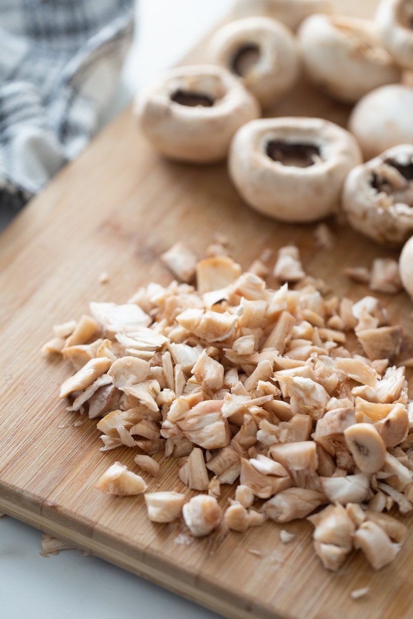These Pork Stuffed Mushrooms are the kind of appetizer that always disappears fast. Tender mushroom caps packed with savory pork, a hint of cinnamon and nutmeg, and a pop of toasted fennel make each bite warm and flavorful. They’re simple to make yet deliver big on taste—ideal for kicking off any gathering with style. chopped mushrooms for stuffing