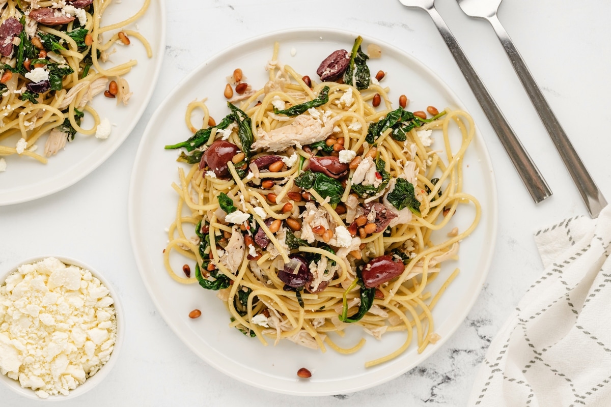 Greek Chicken pasta with feta cheese. a plateful of Greek chicken pasta