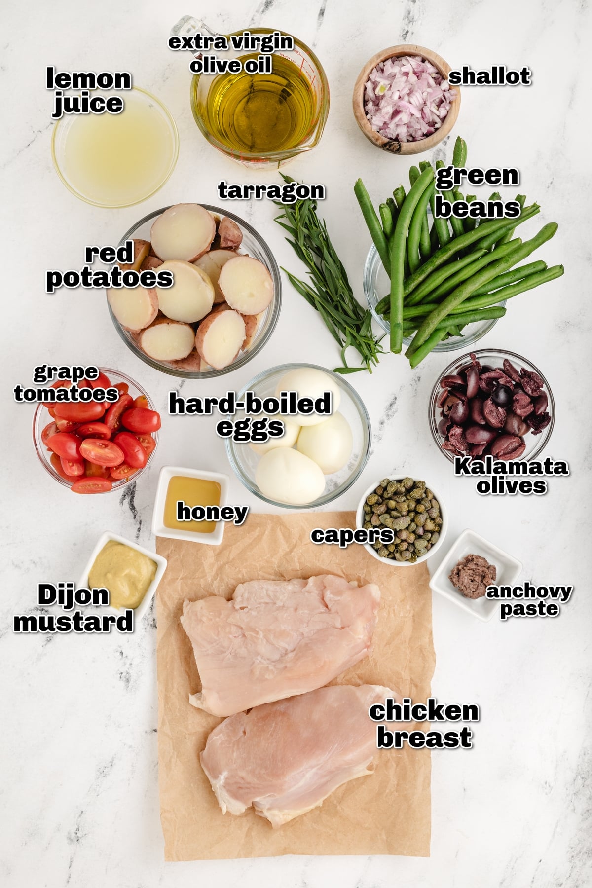 This chicken niçoise salad is one of my favorite full-meal salads. It has all the Mediterranean flair, and when paired with a baguette, it makes a complete dinner. The vinaigrette is distinctively delicious and can't be missed. ingredients