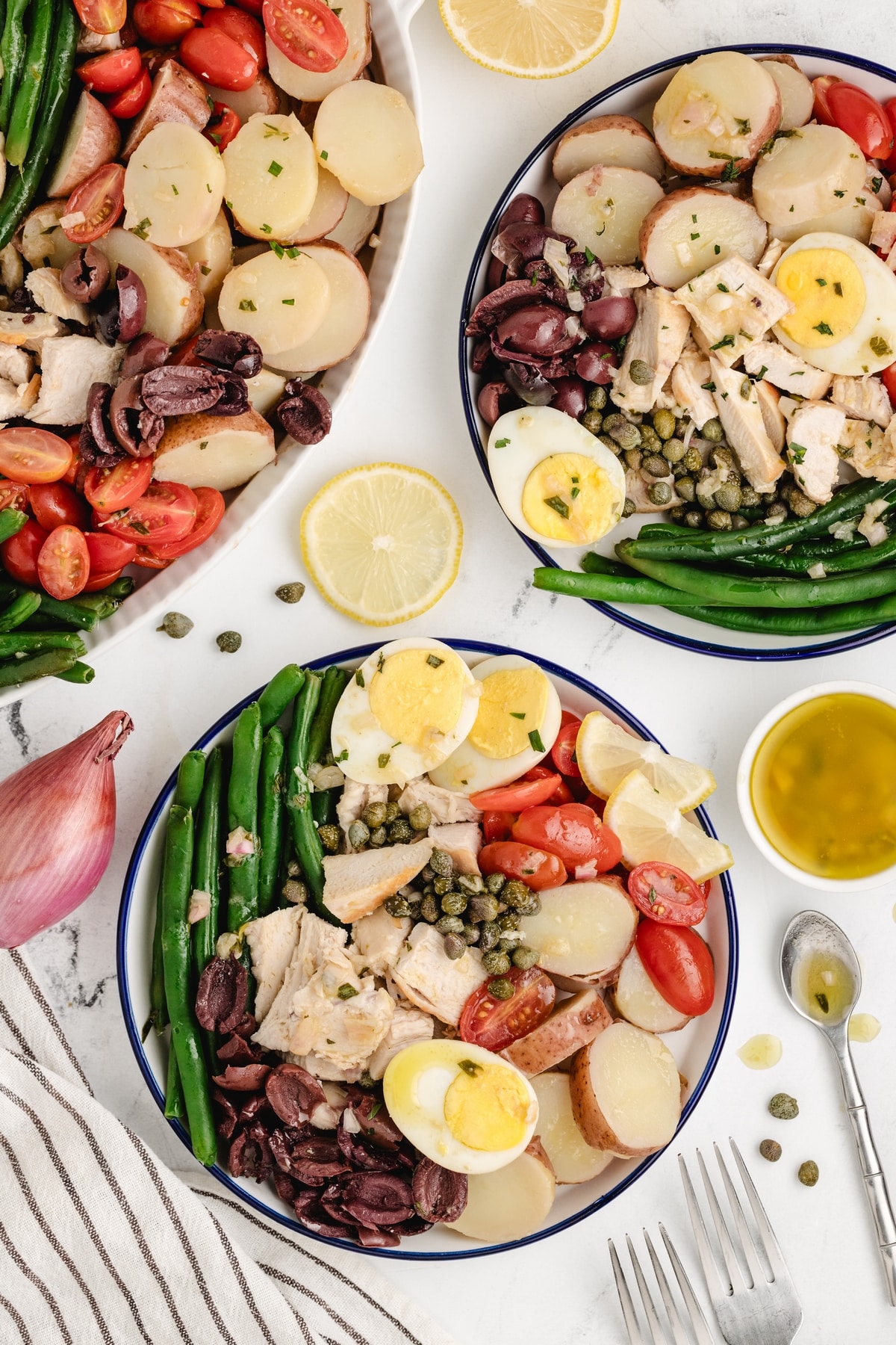 This chicken niçoise salad is one of my favorite full-meal salads. It has all the Mediterranean flair, and when paired with a baguette, it makes a complete dinner. The vinaigrette is distinctively delicious and can't be missed. Chicken niçoise salad