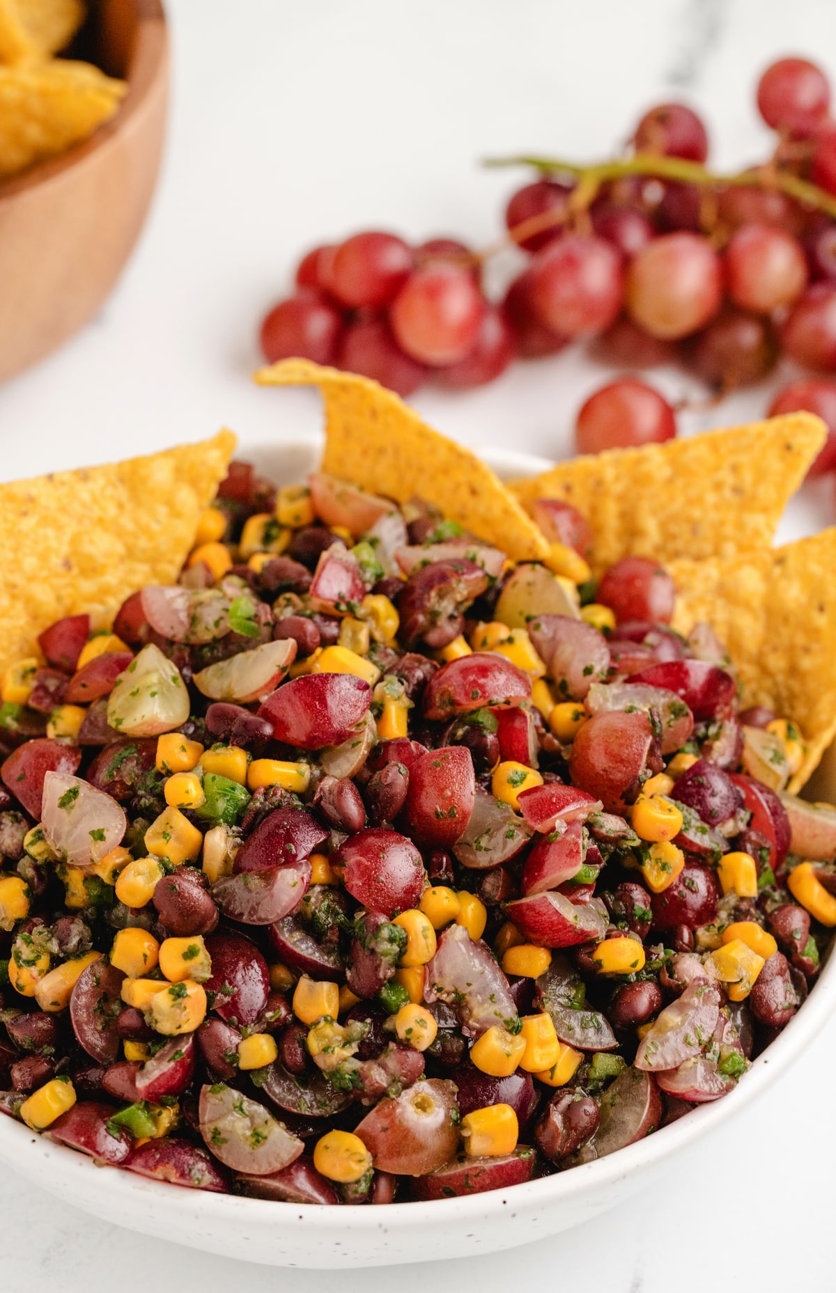 Whenever you want a fresh, flavorful salsa that’s not the typical tomato-based version, this grape, corn, and black bean salsa hits the spot. It’s perfect for fish tacos or serving with tortilla chips. grape corn and black bean salsa