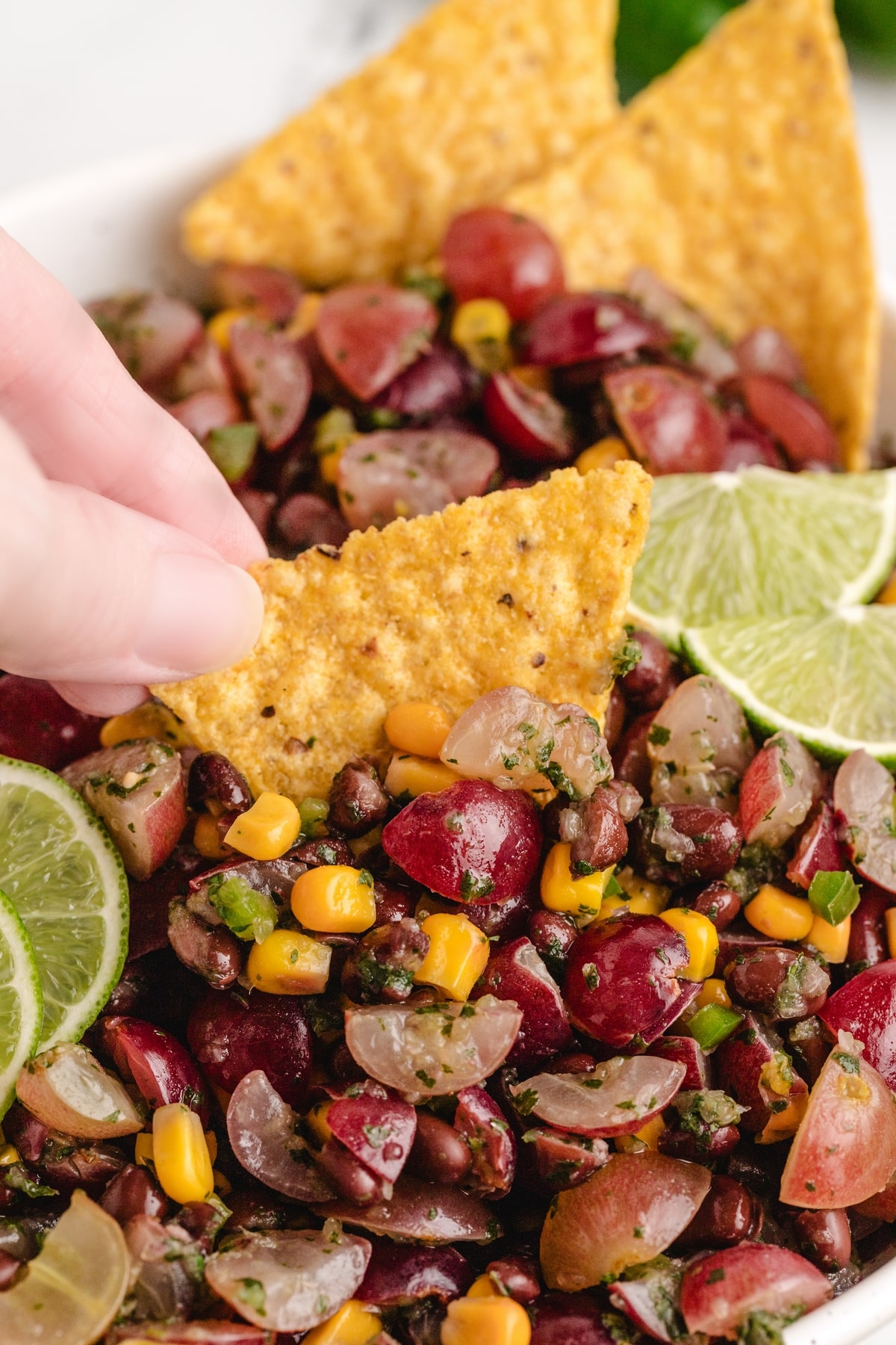 Whenever you want a fresh, flavorful salsa that’s not the typical tomato-based version, this grape, corn, and black bean salsa hits the spot. It’s perfect for fish tacos or serving with tortilla chips. salsa for fish tacos