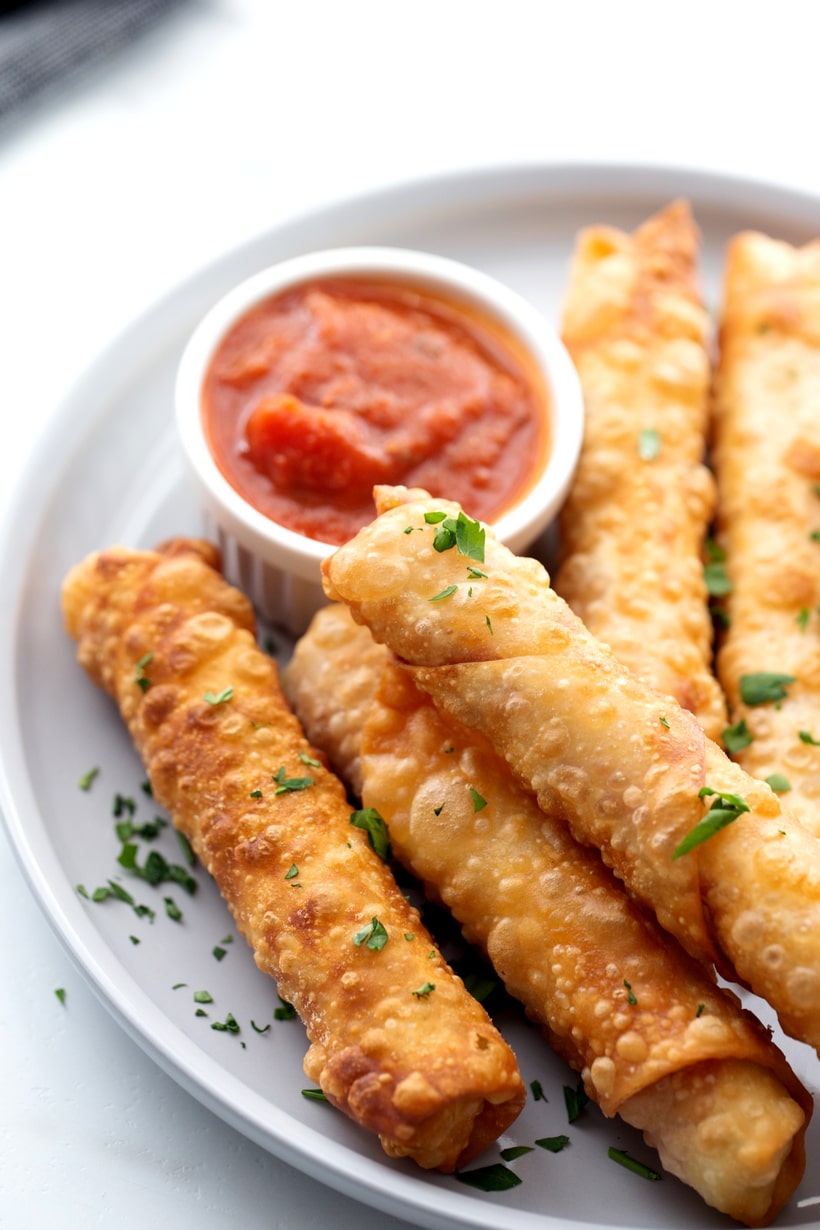 Fried Mozzarella-Pepperoni Sticks made easy with a few simple ingredients. These are a fun appetizer for any party. mozzarella pizza sticks