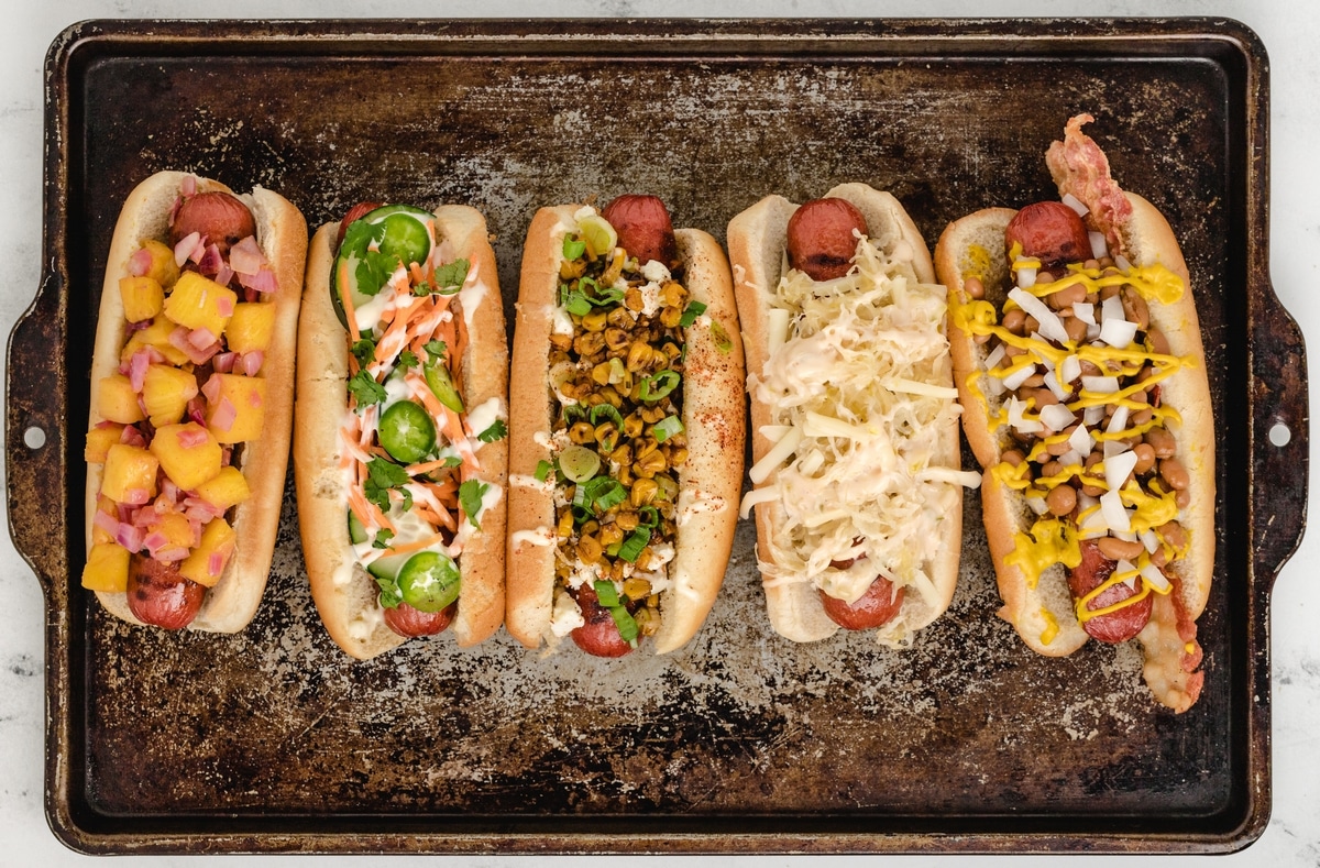 Hosting a hot dog bar is a fun way to showcase that taste for hot dogs can extend far beyond just mustard and ketchup. Experimenting with interesting and unique toppings can lead to surprisingly delicious results, delighting those who try these unconventional hot dogs. hot dogs 5 different ways