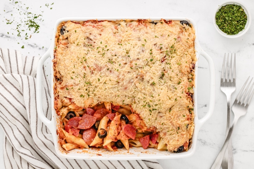 I'm up for pizza in any guise and this Pizza Casserole is a great option. Opting for pasta as a substitute for the base, rather than traditional pizza dough, offers a speedy solution—quicker than DIY or probably even waiting for a delivery. With just a handful of ingredients, pizza night gets a unique twist without sacrificing the deliciousness. penne pizza pasta bake