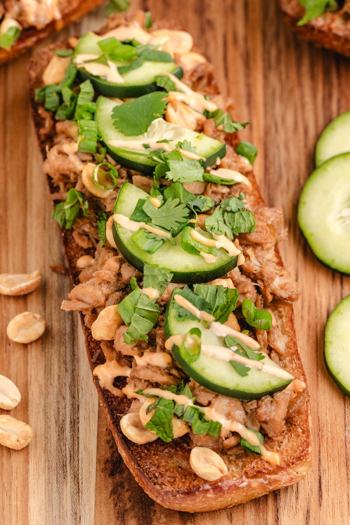 These Open-Faced Thai Chicken Sandwiches are a perfect mix of fresh flavors, with leftover rotisserie chicken, crisp veggies, and a Chili-Garlic Mayo that ties it all together—so easy, you'll be making them all the time. open faced sandwich