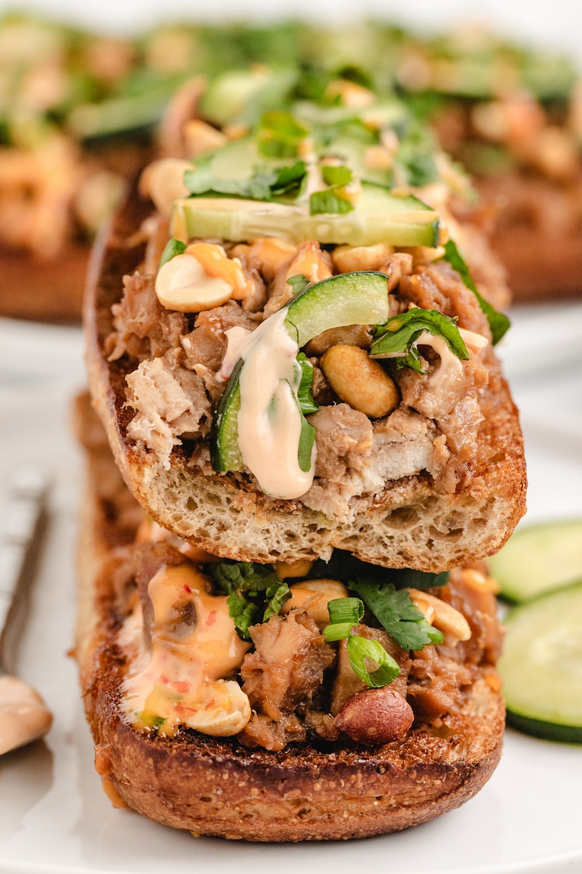 These Open-Faced Thai Chicken Sandwiches are a perfect mix of fresh flavors, with leftover rotisserie chicken, crisp veggies, and a Chili-Garlic Mayo that ties it all together—so easy, you'll be making them all the time. sandwich with Asian flavors