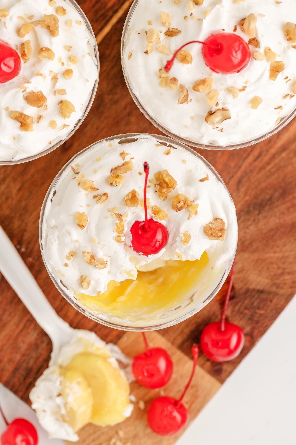 These No-Bake Banana Split "Cakes" are streamlined into cute, individual portions. Perfect for your next gathering—easy to serve, no oven needed, and just the right amount of sweetness. banana split icebox cake