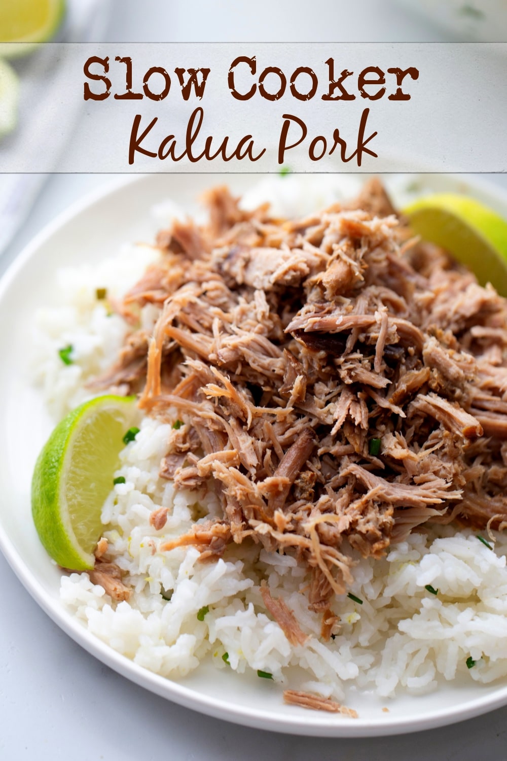Making insanely tender Kalua Pork in the slow cooker draws inspiration from the Hawaiian classic, using just three key ingredients. While I prefer pairing this tender and juicy pork with chive-lime rice (recipe included), it's equally fantastic tucked into a bun. This is also the perfect main course meal for a luau.  via @cmpollak1