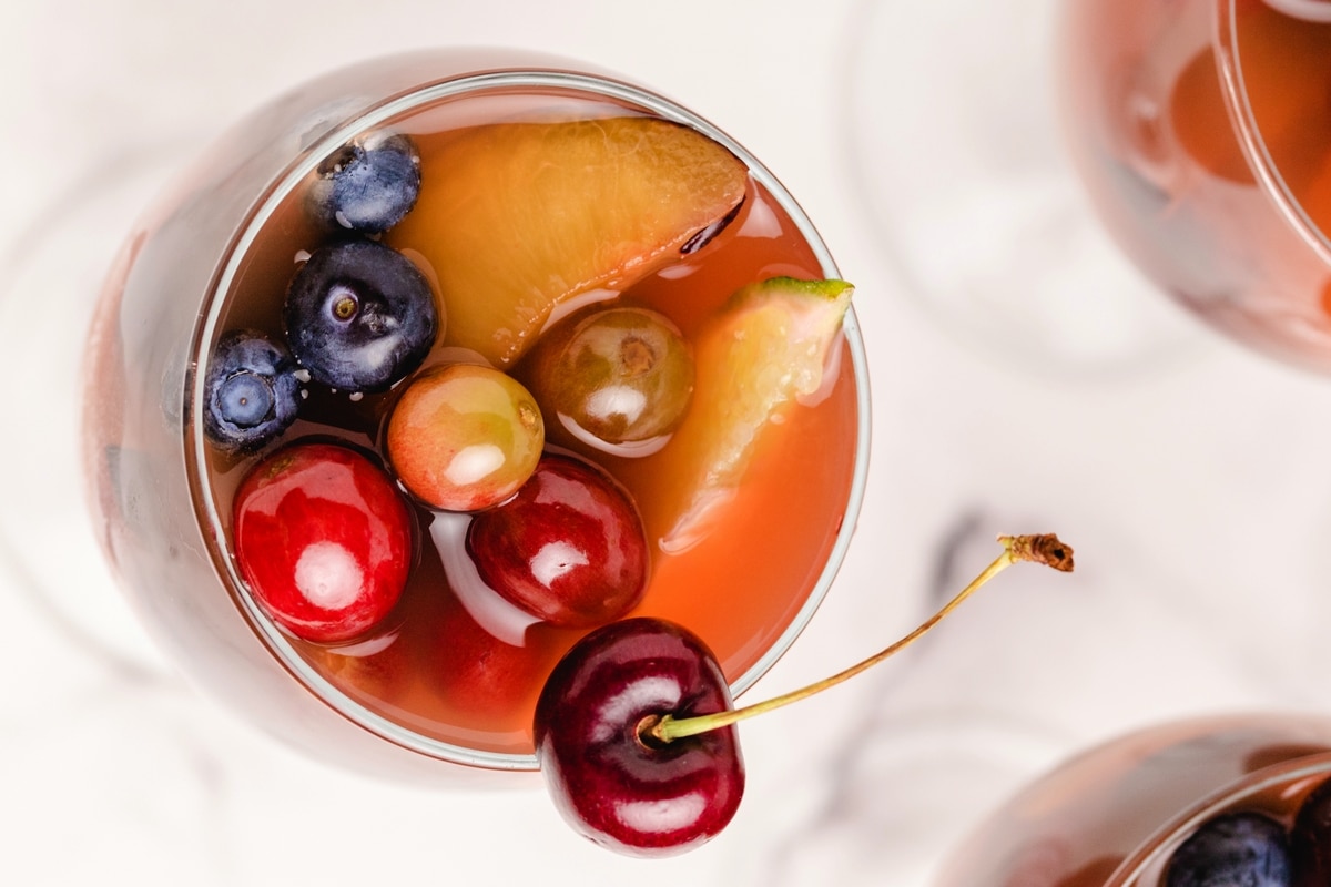 This cherry-orange sangria is a wonderful drink to serve a crowd. It's festive and attractive looking. The possibilities are endless when it comes to the added fruit and it tastes amazing. sangria cherry