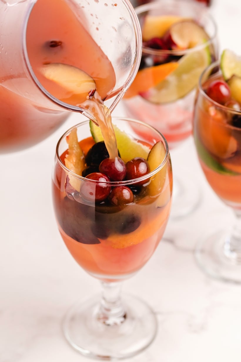 Enjoy the abundance of cherry season with a favorite cherry sangria recipe. Fresh cherries, oranges and grapes make this sangria look as amazing as it tastes. cherry white wine