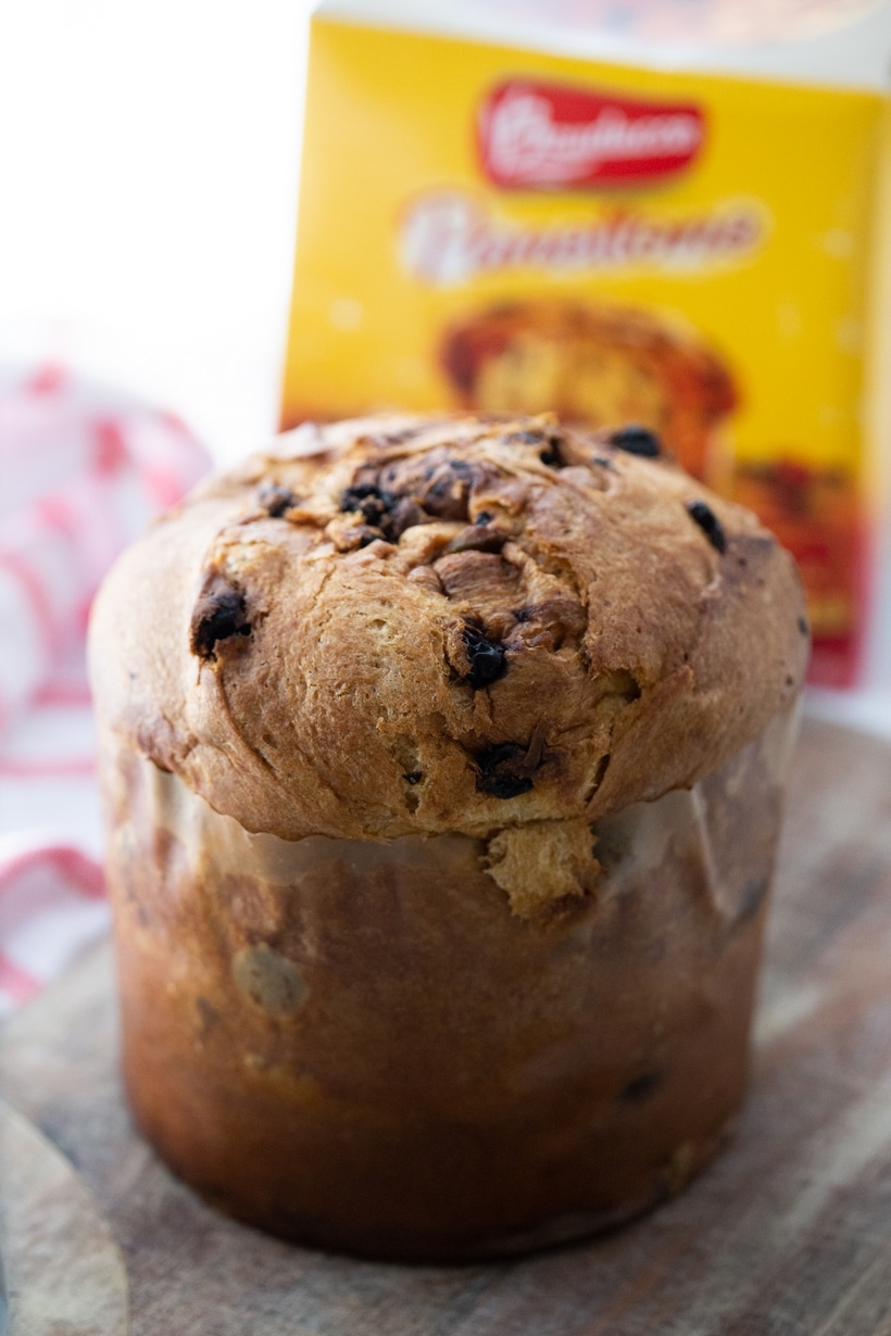 Whole panettone loaf with raisins and candied orange peel.