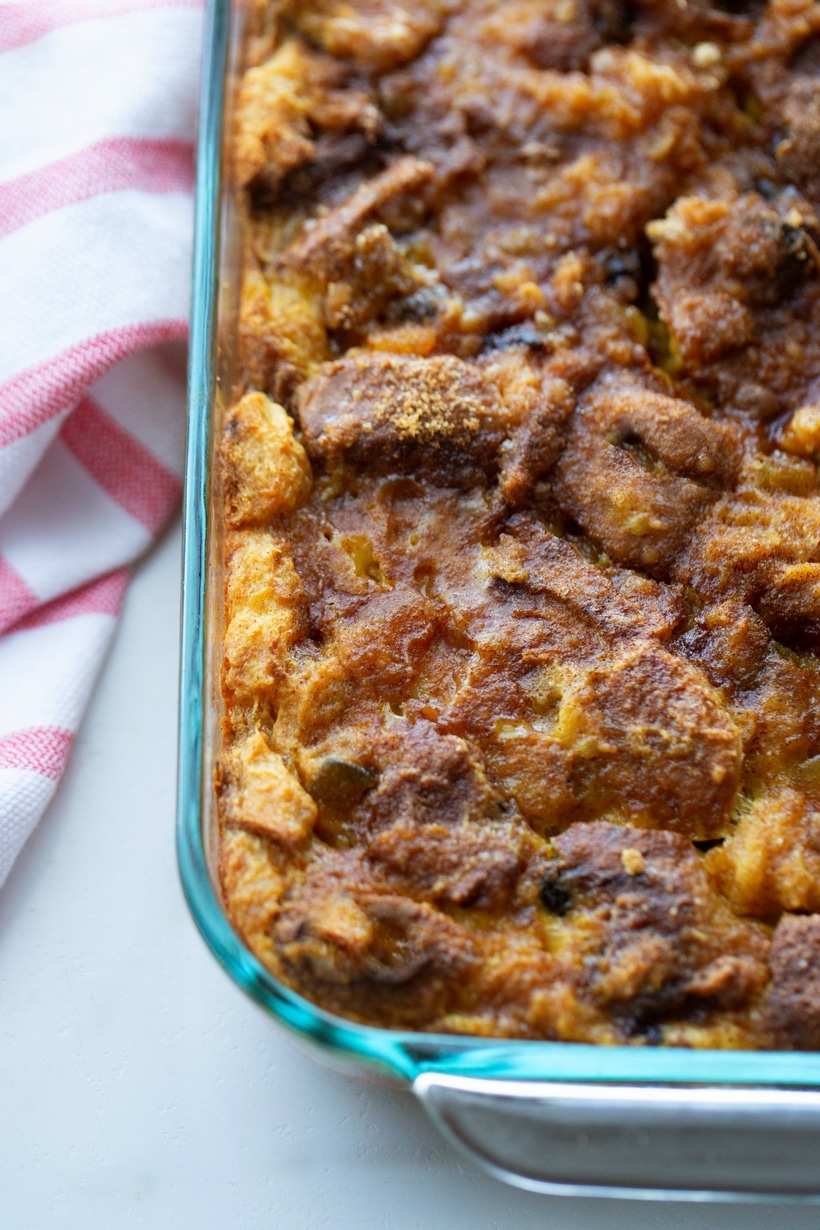 Overhead view of baked Overnight Panettone Eggnog French Toast casserole, with crispy edges.