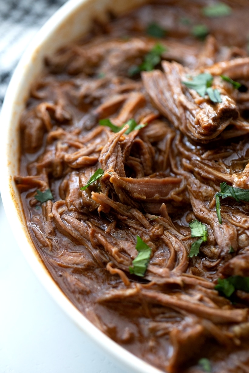chili colorado beef in a white bowl