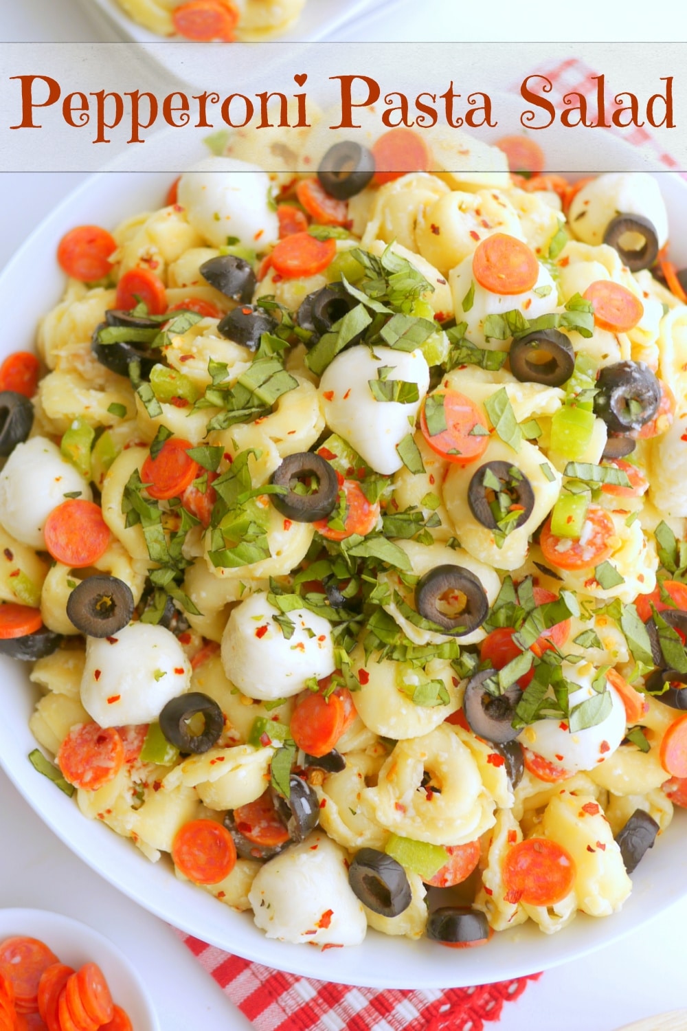 Bursting with bold flavors and with a pizza-inspired twist, this Pepperoni Pasta Salad is the perfect dish for any upcoming get-together. The tender pasta, juicy tomatoes, savory pepperoni, and zesty Italian dressing tie it all together in one delicious pizza pasta salad recipe.  via @cmpollak1