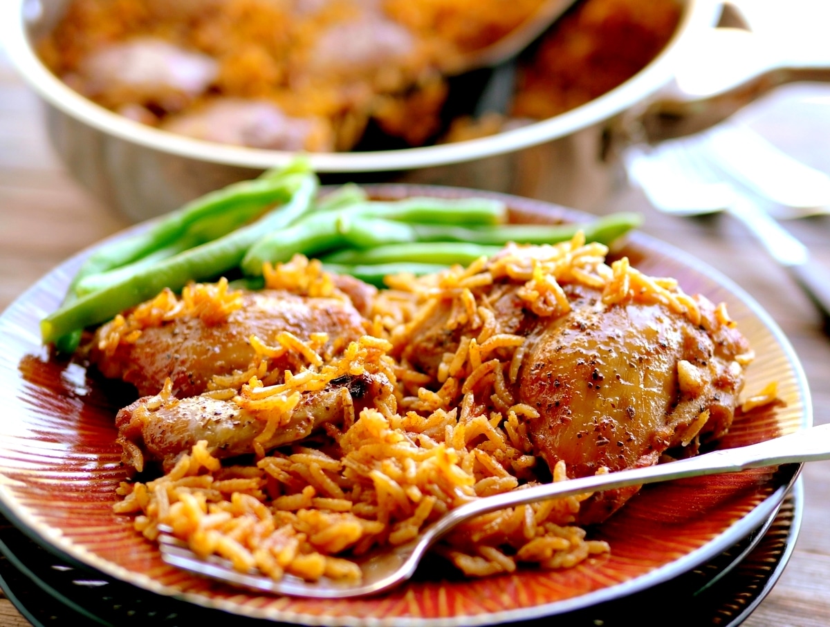 This stove top chicken and rice has been perfected over the years, with all the flavor and spice you'd expect in a weekend dish. The best part is, it’s still easy enough to throw together on a busy weeknight. chicken and rice easy