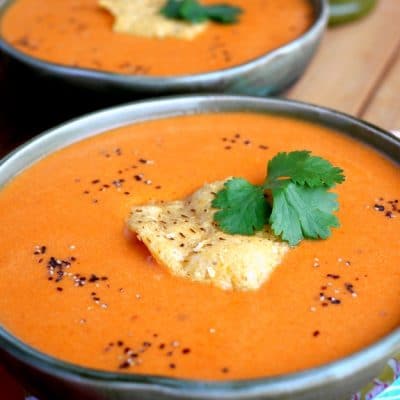Two bowls of tomato soup.