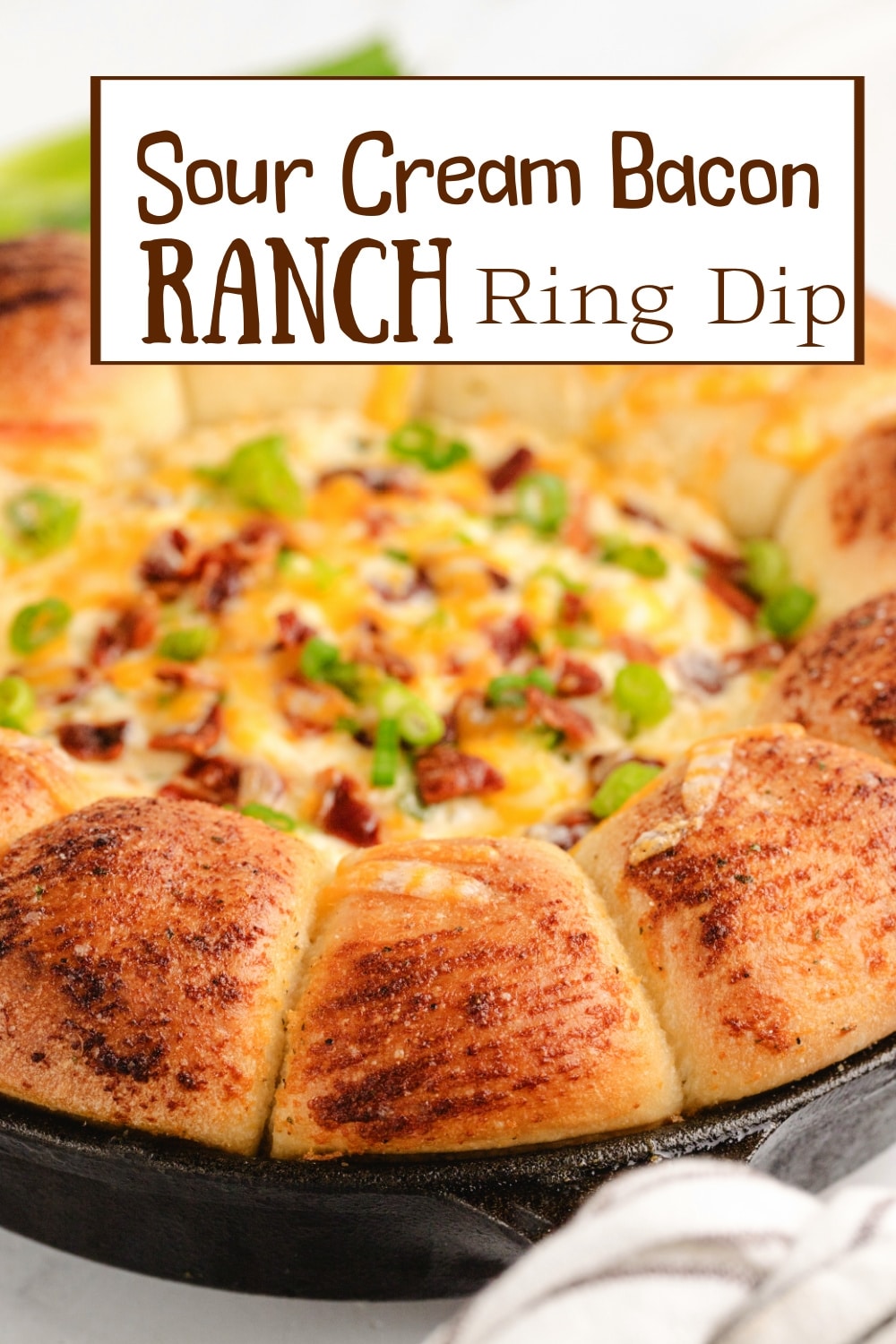 Dig into this Sour Cream Bacon Ranch Ring Dip—it's the ultimate crowd-pleaser. Baked with fluffy dinner rolls, it's a snack you'll crave over and over. via @cmpollak1